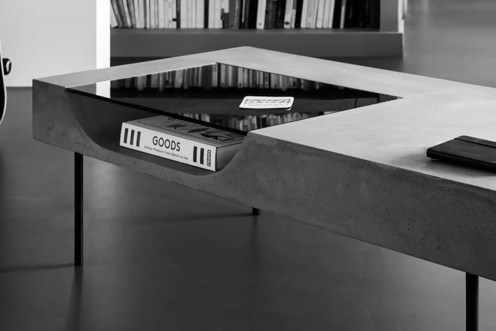 Modern concrete coffee table with a storage niche of designer Bertrand Jayr for Lyon Concrete