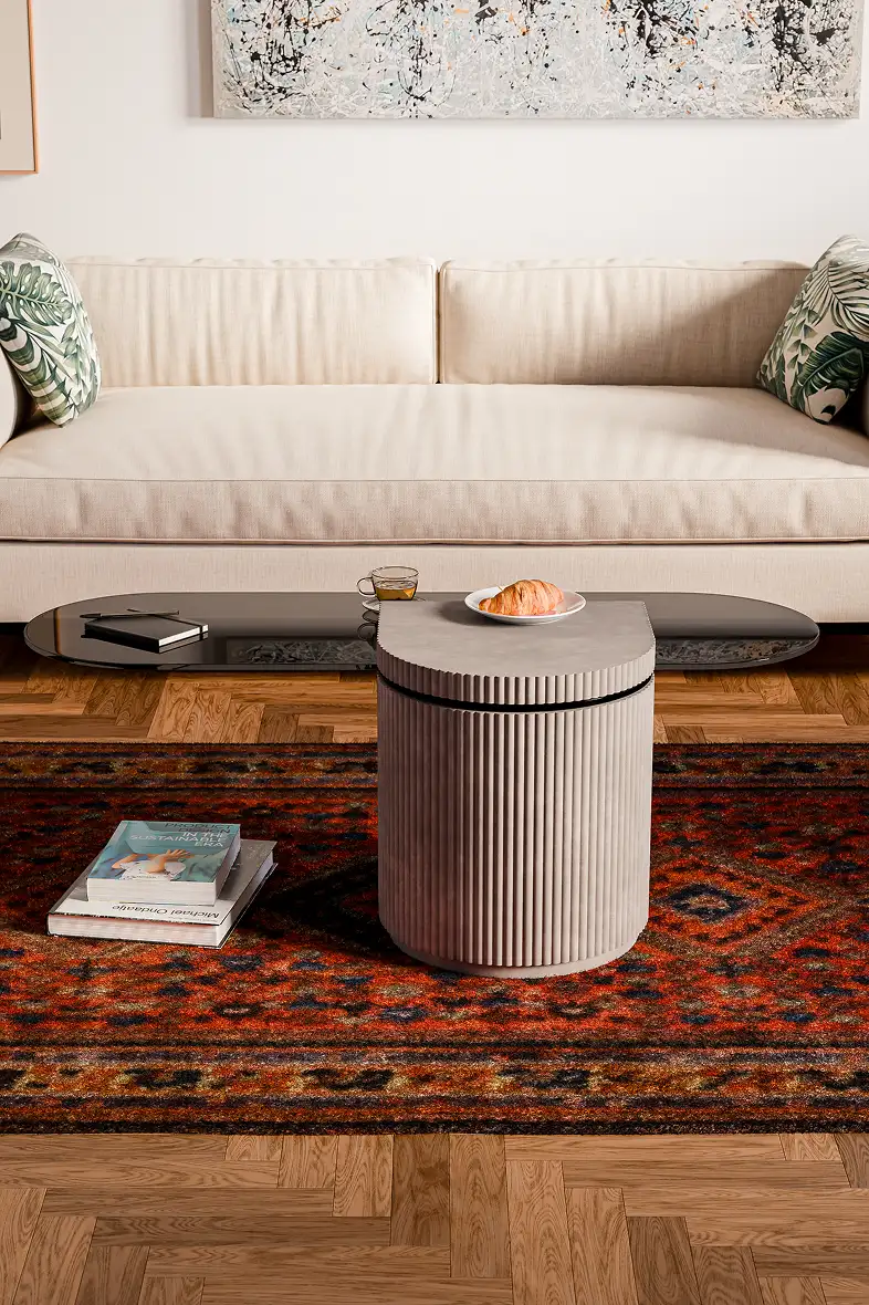 Concrete coffee table in a warm living room with Persian rug and wood parquet