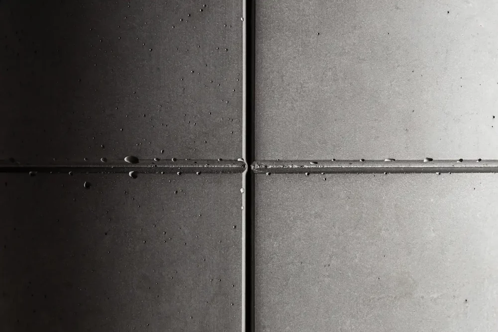 Close-up of raw concrete texture on a design furniture piece by Lyon Béton
