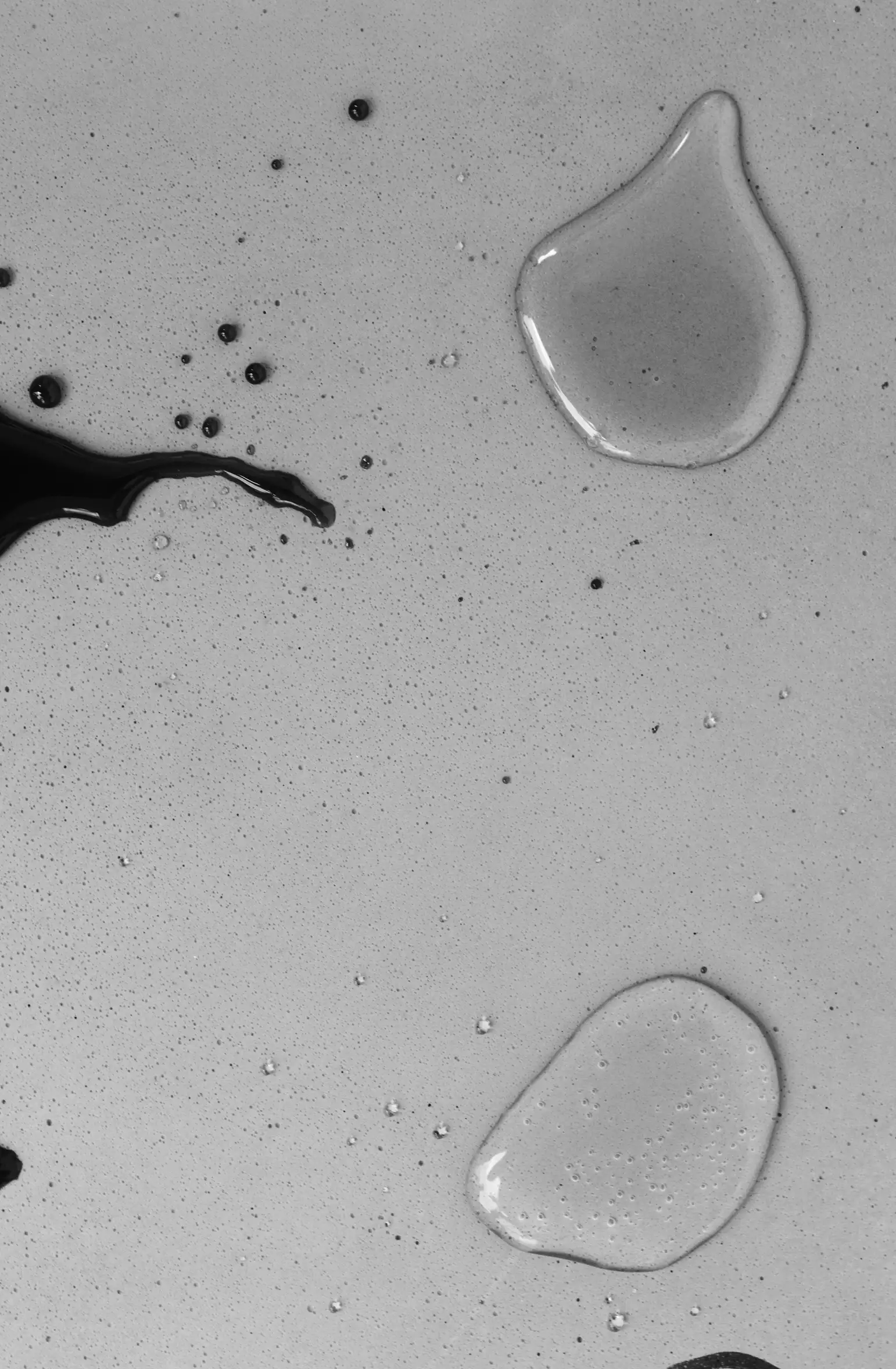 Water beading on a waterproof-treated concrete surface — care test