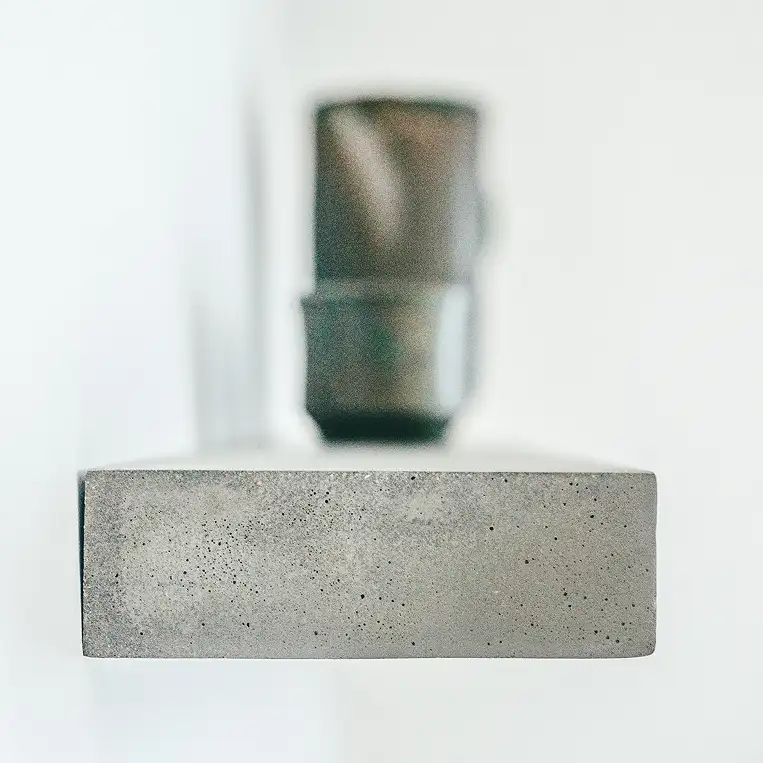Concrete design wall shelf, front view on white background — Lyon Béton